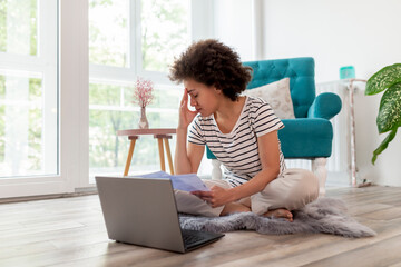 Woman reviewing finance statments
