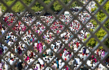 Huge crowd of devotees visible from the window in the grand temple of Sri Jabho ji the religious leader of the Bishnoi society.