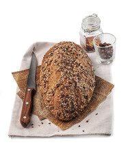 food photography of bread side view on a white background on a craft paper close up