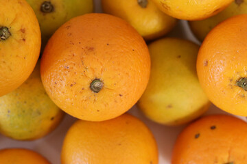 Beautiful oranges arranged on a table. A fruit rich in vitamin c.