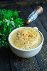 cup of coffee and spruce on the table, new year mood serving size. food background top view copy space 