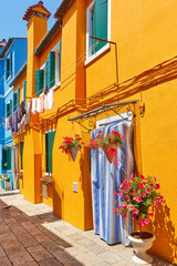 Street with colorful houses in Burano in Venice
