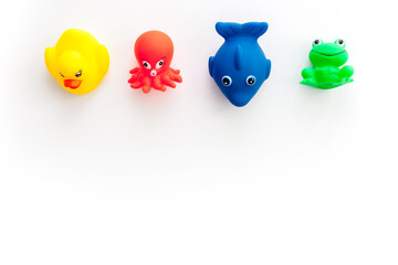 The concept of children’s bath toys. White background top view copyspace