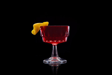 Boulevardier cocktail served up, black background