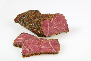 Tasty meat sausages over white background