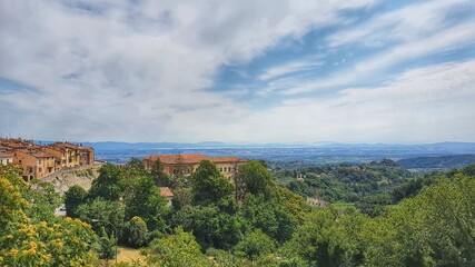 Fototapeta na wymiar Beautiful view from Montepulciano with Trasimeno Lake on the background.