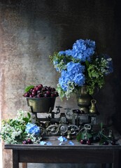 The old stump on which lies a ripe cherry and old scales