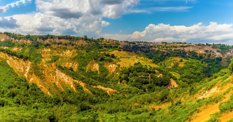 A view from the hill top settlement of Civita di Bagnoregio in Lazio, Italy towards Lubriano in summer