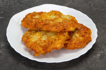Roasted potato pancakes in the bowl