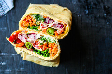 tortilla or burrito wrap stuffing vegetables vegetarian pita bread Menu concept Takeaway serving size. food background top view copy space organic 