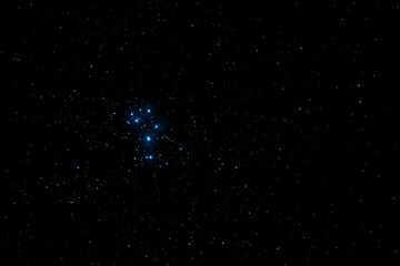 pleiades constellation seen from a telescope