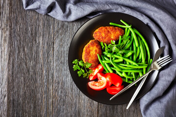 chicken patties served with steamed green beans