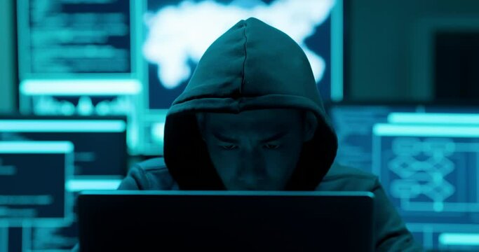 Asian male angry hacker