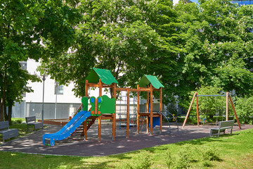 Children playground in the park on a sunny day