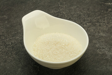 White sugar in the bowl