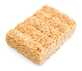 Honey bars with sesame seeds on white background