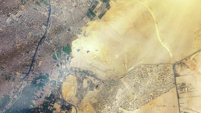 The Giza pyramid complex, also called the Giza Necropolis, from Space. Elements of this video furnished by NASA.