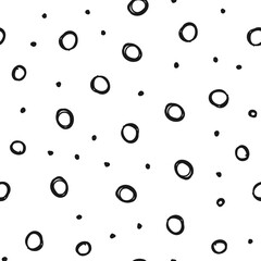 Hand drawn circles seamless pattern. Random dots loop texture background.