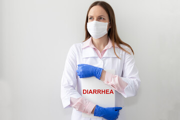 Diarrhea. Medical Doctor shows information word inscription diarrhea