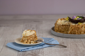 Selective focus to piece of cake with chocolate cream.