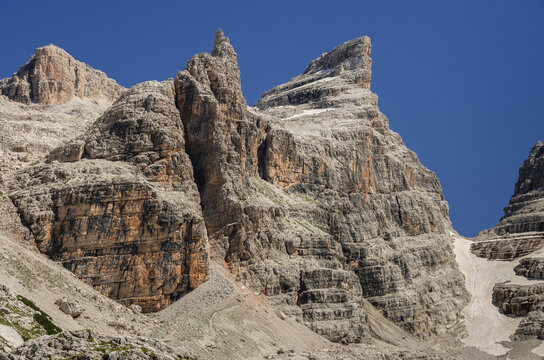 Campanile di Vallesinella, Punta Massari summits, as seen from the trail to Rifugio Tuckett, Brenta Dolomites, Italy.