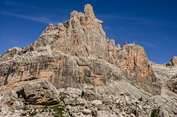 Fototapeta na wymiar Campanile di Vallesinella, Punta Massari summits, as seen from the trail to Rifugio Tuckett, Brenta Dolomites, Italy.