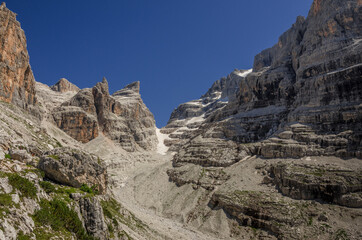 Fototapeta premium Castelletto Inferiore, Castelletto Superiore, Cima Sella, Campanile di Vallesinella, Punta Massari summits, as seen from the trail to Rifugio Tuckett, Brenta Dolomites, Italy.