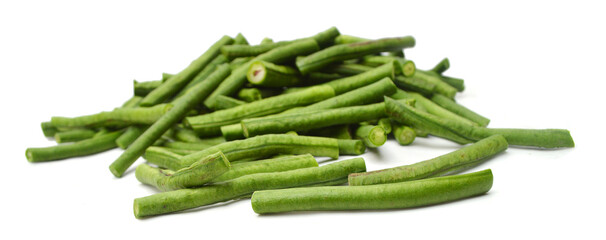 pieces of fresh cut long beans(Vigna unguiculata subsp. sesquipedalis) on white