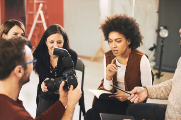 Attendees attending a photography course in studio.