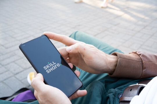 Skillshare App On The Phone In The Hands Of The Skillshare Guy The Logo On The Screen..New York City, USA - July 13, 2020