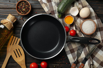 Composition with ingredients for cooking on wooden background, top view