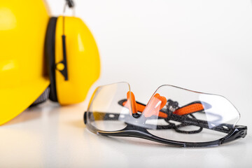Safety glasses and a work helmet. Workwear for production workers.