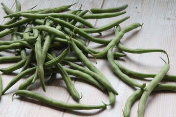 green beans on a white background