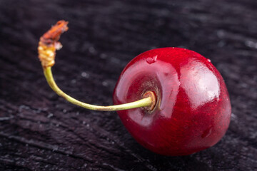 sweet cherry on a black background
