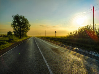 image of a country highway at sunset