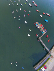 Fototapeta na wymiar Small Boats Moored in Galicia. Spain. Drone Photo