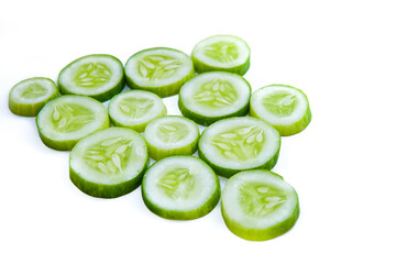 slices of fresh green cucumber. isolated white background