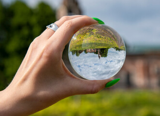 The old dilapidated Church is reflected in the lens.