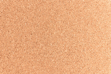 Fototapeta na wymiar Flat lay view of the texture of a cork board 