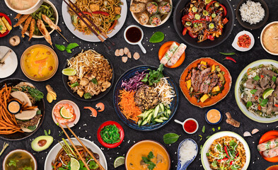 Asian food background with various ingredients on rustic stone background , top view. Vietnam or Thai cuisine.