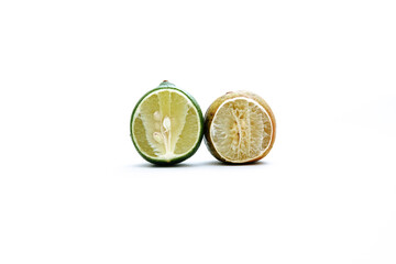 slices of fresh lime and dried lime. isolated white background