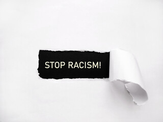 Stop racism. Protest against human rights violations in the United States. Writing on torn paper,...