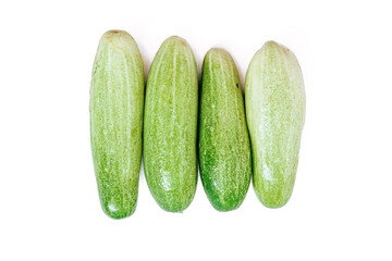 fresh green cucumbers with a background isolated white background