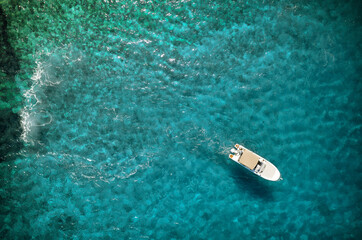 Speed boat in beautiful mediterranean sea, aerial view