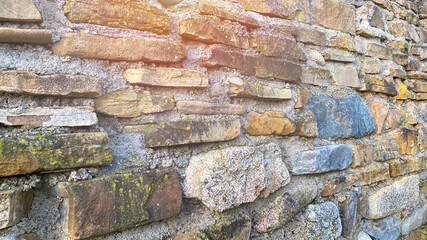 Old stone wall textute to background.