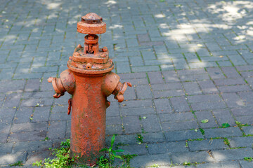 Old fire hydrant on the pavement