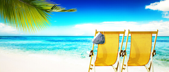 Pair of beach chairs with Coronavirus on vacation