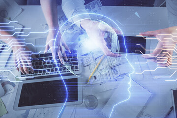 Double exposure of man and woman working together and human brain hologram drawing. Brainstorm concept. Computer background. Top View.