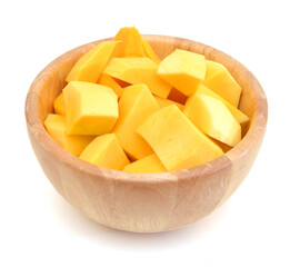Mango slice isolated in wooden bowl on white background