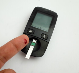 photo of digital glucose meter